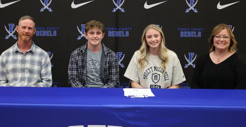 Ava Queen and her family smile after she signed her letter of intent to attend and play basketball at Truett McConnell University. Shown are, from left, Jeff Queen, Eli Queen, Ava Queen and Tara Queen.