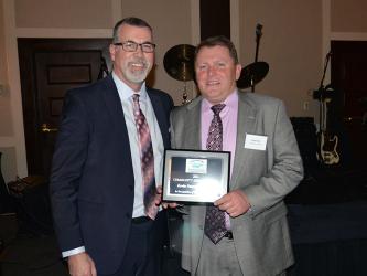 Kevin Panter Insurance was honored with the Fannin County Chamber of Commerce Community Service award at the chamber’s annual banquet Saturday night. Panter, right, received the award from Richard York.