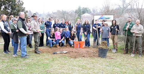 This is part of the crowd who gathered to celebrate Arbor Day last Thursday outside The Art Center on West Main Street in Blue Ridge. A Serviceberry tree was planted by members of the FFA from both Fannin County High School and Middle School  and 4-H club members with help from representatives of the Georgia Forestry Commission. 