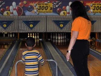 West Fannin Elementary student Raymond Evans is pictured lining up to bowl at last week’s Special Olympics event at Fannin Lanes.