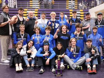 The Fannin Rebels Wrestling team smiles after securing the Area 8AA Traditional Championship Saturday, February 4, at Union County High School. Shown are from left, front row, Mikayla Holloway, Emma Shaw, Thomas Golden, Angela Alvarez, Taylor Collis and Tristan Siler; middle row, Carson Collis, Finn Thoreson, Landon Poole, Colby Shaw, Matthew Crowder, Drake Cantrell; and back roq, Coach Alan Collis, Logan Long, Coach Wade Hodges, Corbin Davenport, Blake Summers, Cooper Moreland, Jackson Mercer, Head Coach C