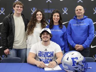 Fannin County High School senior Andrew Waldrep signed his letter of intent Wednesday, February 1, to further his athletic and academic career at Shorter University as a part of the football team. Waldrep is pictured with Evan Taylor, Emily Waldrep, Valerie Waldrep and Brian Waldrep. 