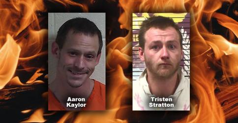 Two suspects charged with arson