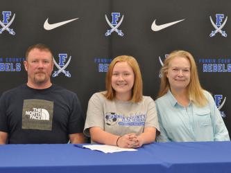 Fannin County High School senior Ivy Hyde signed her letter of intent to continue her academic and athletic career as part of the Dalton State College (DSU) women’s soccer team. Hyde plans on pursing a Health and Wellness degree while attending DSU. Shown are, from left, father Chris Hyde, signee Ivy Hyde, and mother Kristi Hyde. 