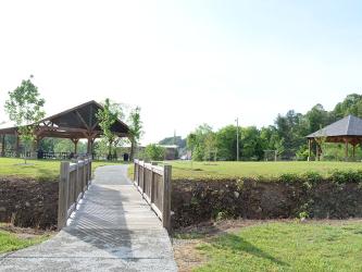 The expansion of the Toccoa River Park in McCaysville is hoped to be finished by Friday, Police Chief Michael Earley told the city council last week. Besides his normal duties, Earley has been tasked with looking after the improvements that include a new basketball and pickleball court, fencing and moving the historic Veterans Memorial monument.