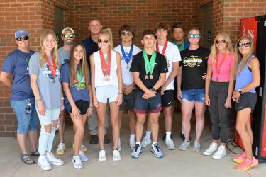 Many of the Fannin track and field athletes and coaches went to the GHSA State Championship. Pictured, from left, Assistant Coach Hannah Godfrey, Ava Acker, Assistant Coach Lucas Roof, Karli Sams, Assistant Coach Chad Galloway, Lindsey Holloway, Corbin Davenport, Zechariah Prater, Tyler Stevenson, Matthew Crowder, Assistant Coach Alden Falls, Carlee Holloway, Head Coach Miranda Roof. 