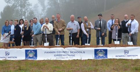 School officials gathered with local leaders for the official groundbreaking for the new Fannin County Schools Greenhouse located next to the Agriculture Facility. Shown during the ceremony are, from left, Shannon Dillard-Miller, Jamie Hensley, Dakoda Moore, Christie Gribble, Kaleighann Ware, Marie Woody, Seth Davis, April Hodges, Bobby Bearden, Erick Youngberg, Chad Galloway, Terry Bramlett, Mike Spurling, Mike Cole, Lewis Deweese, Darren Danner, Rhonda Mathews, David Henson and Scott Ramsey.