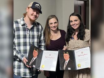 Austin Hayes and Haley Parks, right, are shown with April Michelle Burrell of Murphy, North Carolina. Hayes and Parks are credited with saving Burrell’s life in 2022 following a car crash on Highway 60.