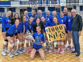 Peyton Stone, kneeling in front, was honored for her 1,000th kill that occurred during a recent match for the Fannin County Lady Rebels.