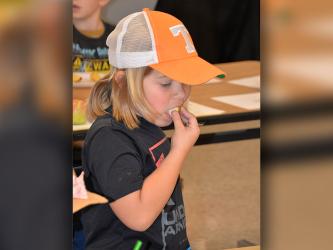 Thaddeus King was among the East Fannin first graders who took part in Apple Day at the Fannin County School System Agriculture Facility. The day included learning the different tastes of different varieties.