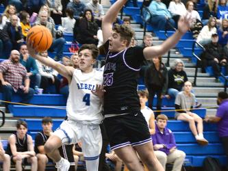 Fannin County’s Matthew Ponton drives for two points in action against Union County.