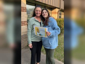 Ellie Carter, left, of the Fannin Mountain Education campus won the Georgia Young Author’s Fair in her grade level for the entire Mountain Education System. She is shown with her English teacher, Valerie Taylor.