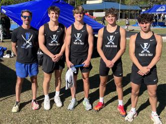 Shown at the McEachern Invitational are, from left, Coach Dr. Lucas Roof, Brodey Angel, Lawson Sullivan, Braxton Cheatham, and Zech Prater.